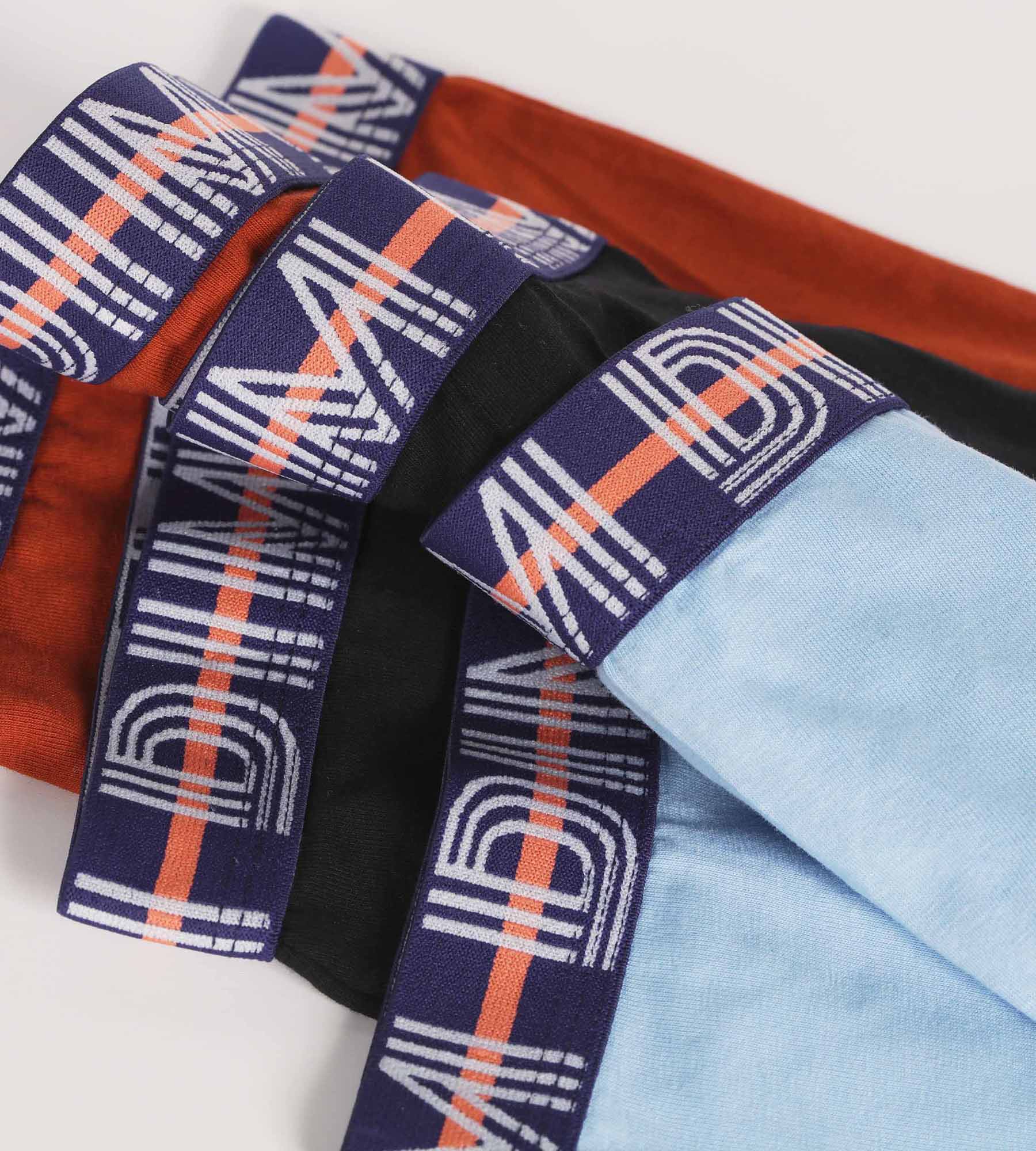 DIM Pacco da 3 boxer da ragazzo blu e rosso con grafica in vita in cotone elasticizzato Dim