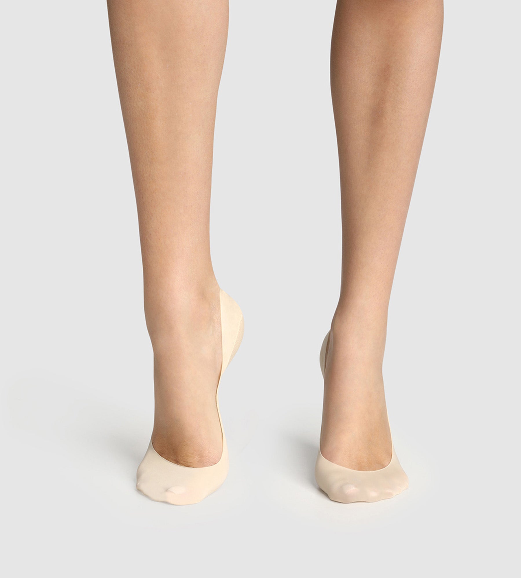 DIM Pacco da 2 protezioni per piedi con tacca media Dim InvisiFit Natural