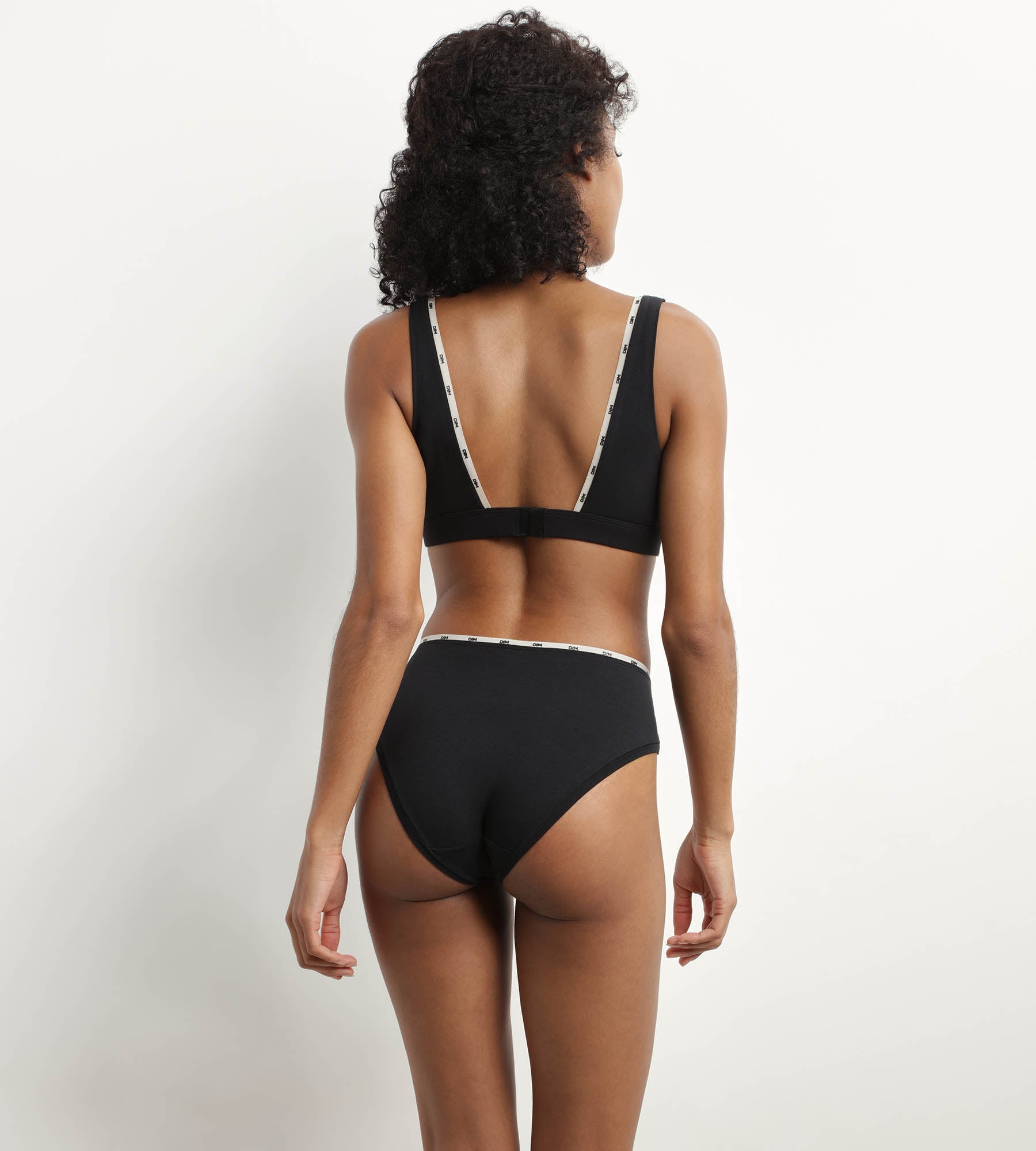 DIM Slip donna in cotone modal nero con profili beige DIM Icons Essentiel