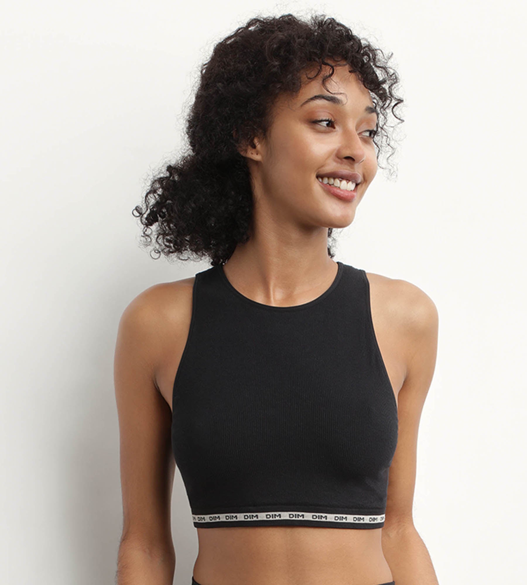 DIM Crop top nero in modal di poliammide a coste senza cuciture di DIM Icons