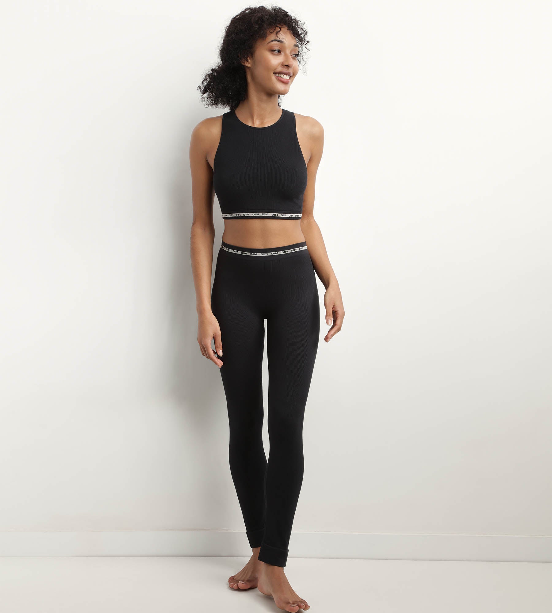 DIM Crop top nero in modal di poliammide a coste senza cuciture di DIM Icons