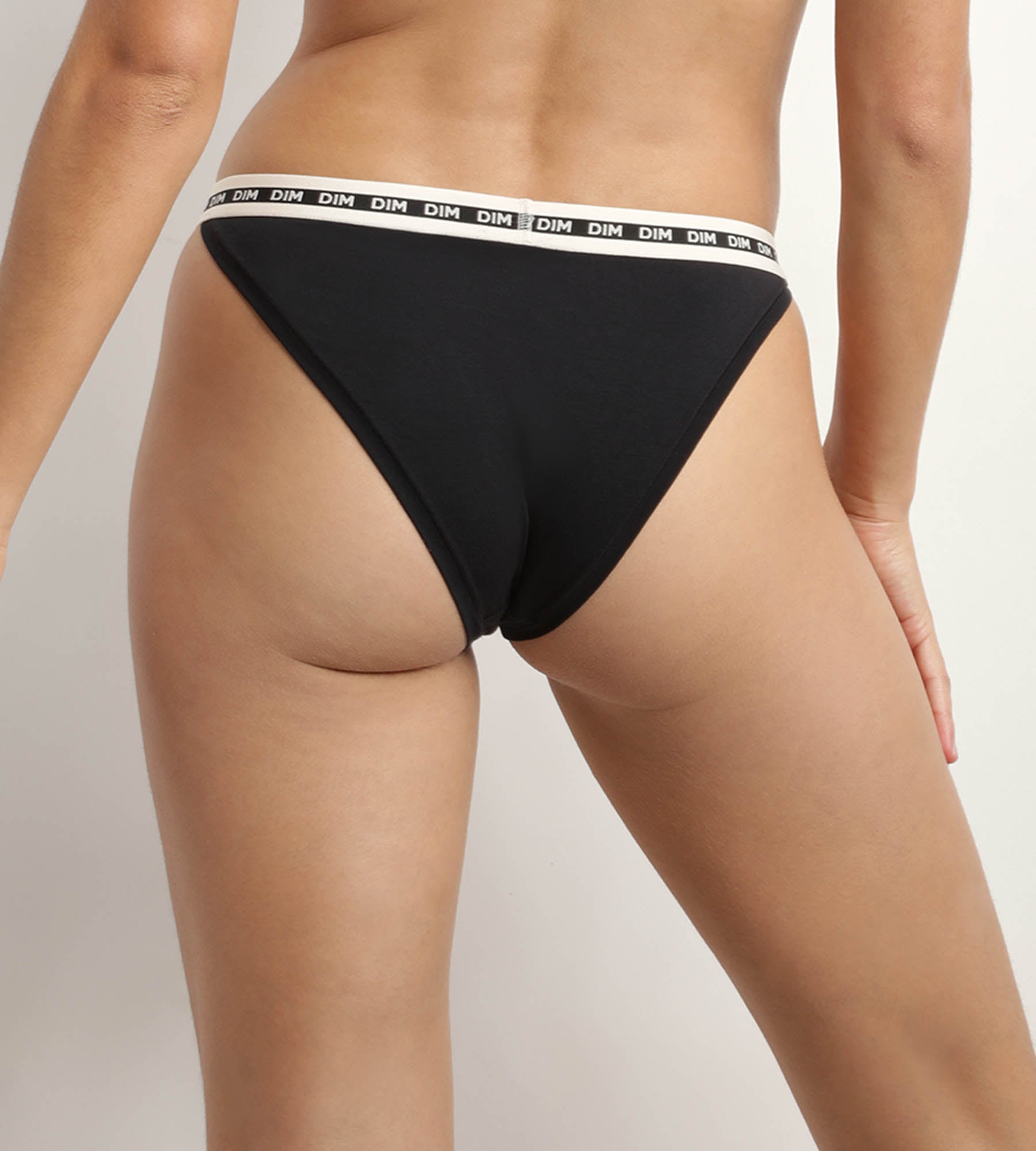DIM Tanga in cotone modal nero con cintura beige DIM Icons Essentiel