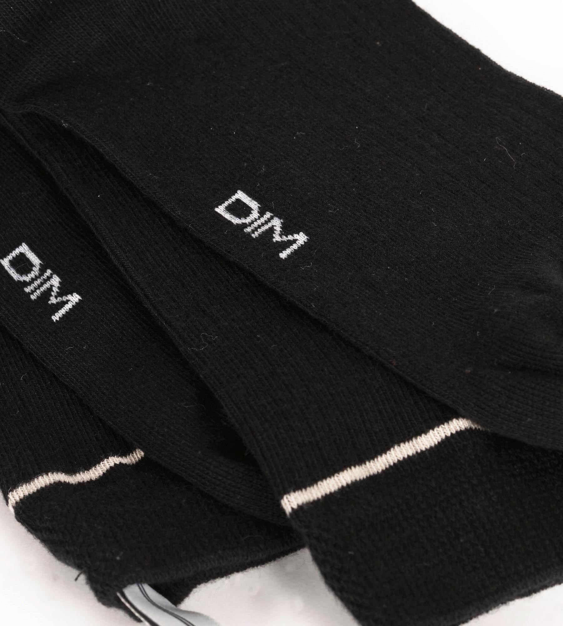 DIM Calze unisex a coste in cotone nero con linea crema DIM Icons