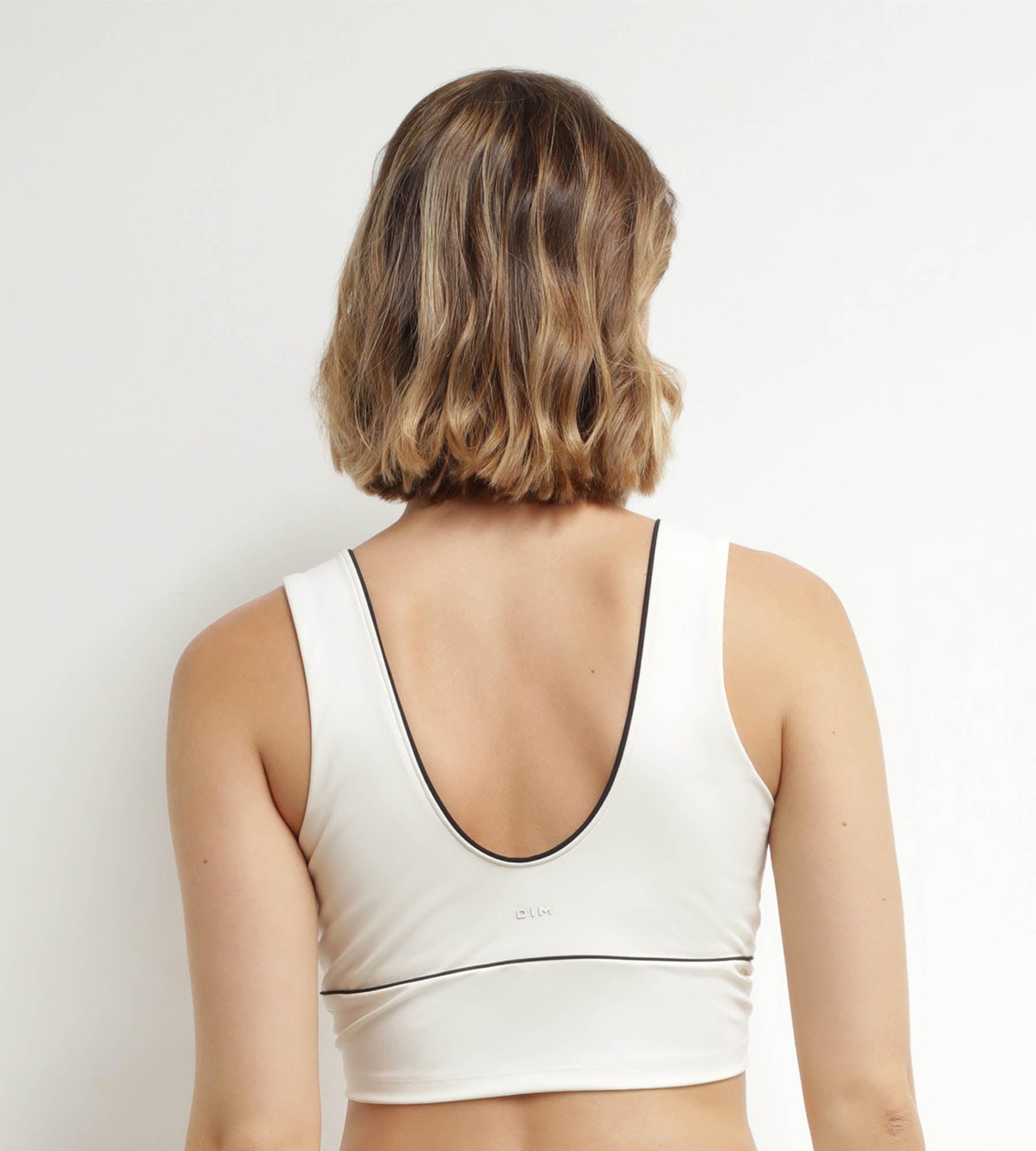 DIM Reggiseno lungo modellante in microfibra ecrù DIM Move