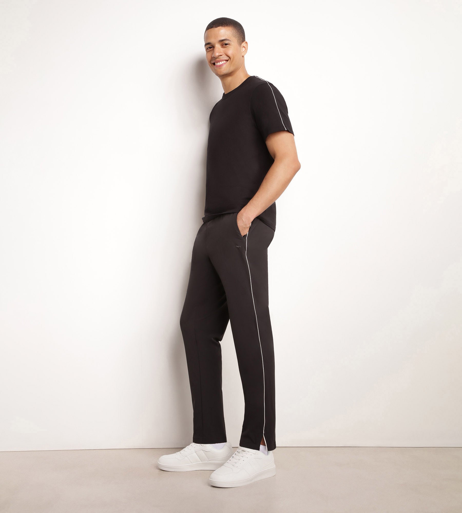 DIM Pantaloni chino da uomo in jersey elasticizzato Nero DIM Move