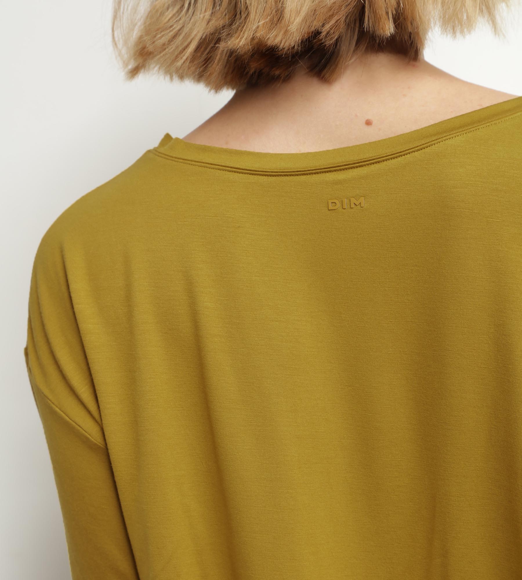 DIM T-shirt sportiva donna in viscosa verde oliva con retro aperto DIM Move