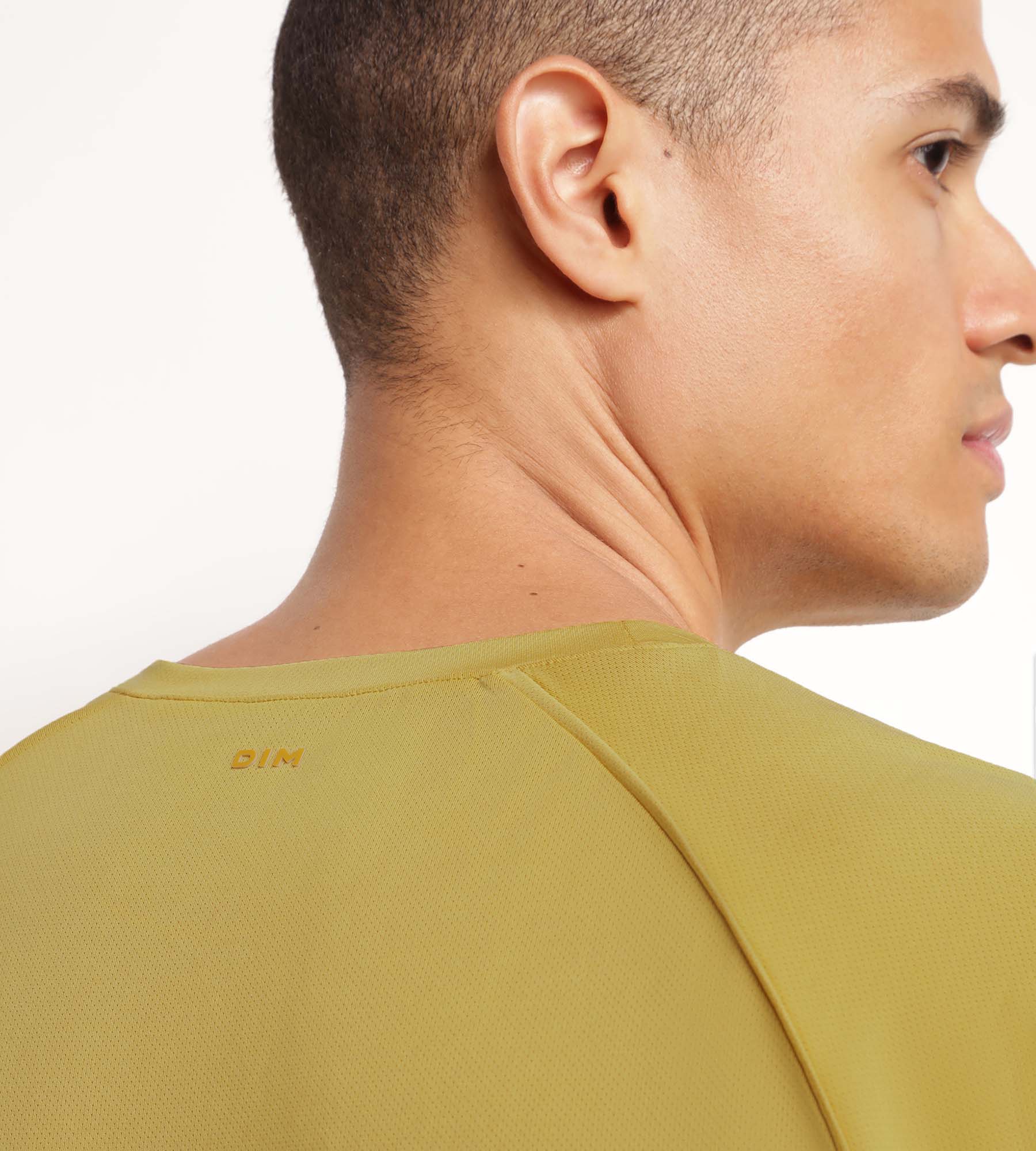 DIM T-shirt sportiva uomo in tessuto aerato Olive DIM Move