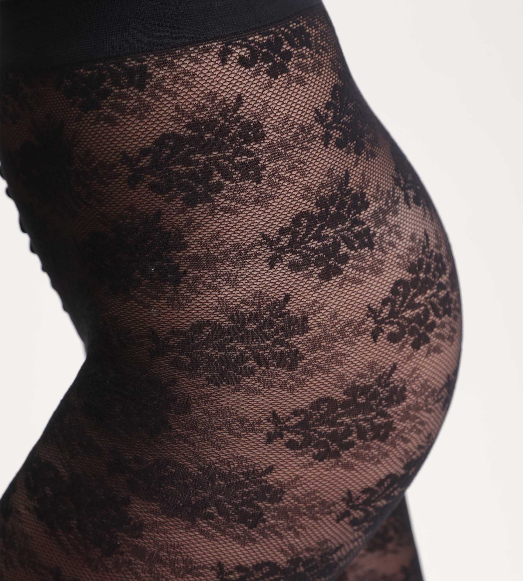 DIM Collant nero con bouquet floreale Dim Style