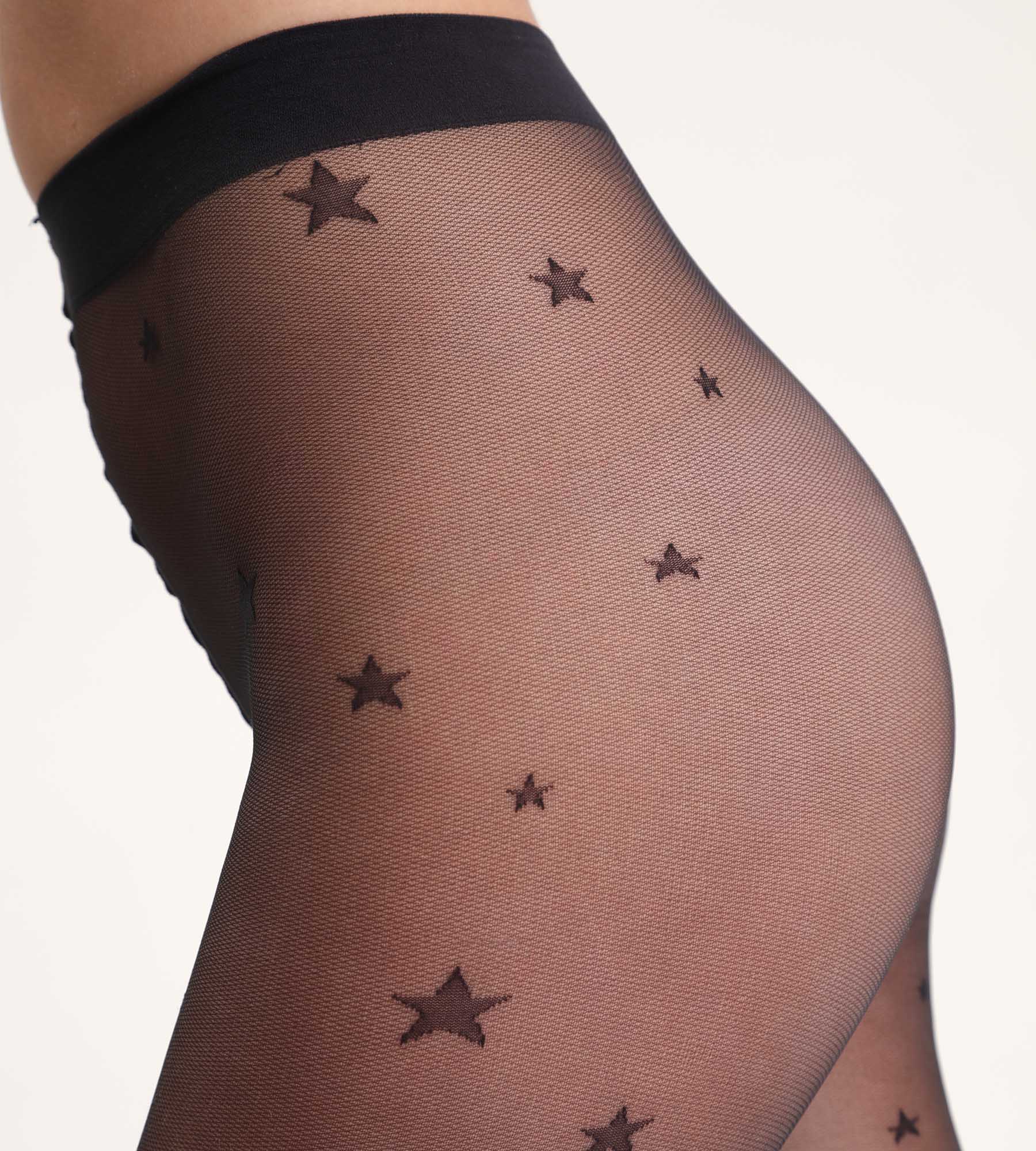 DIM Collant nero trasparente con motivo a stelle Dim Style
