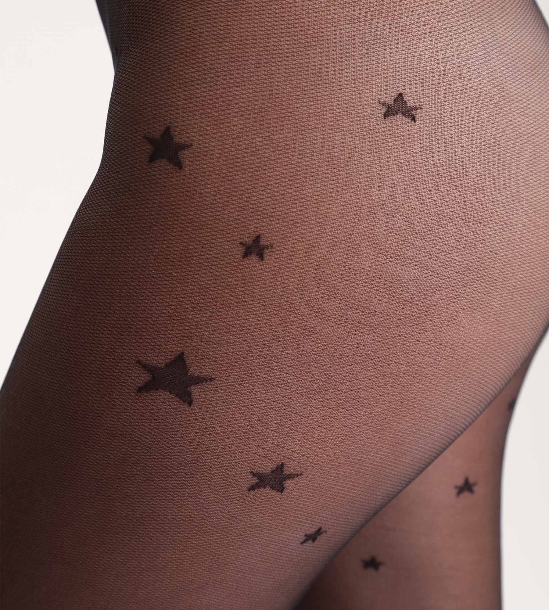 DIM Collant nero trasparente con motivo a stelle Dim Style