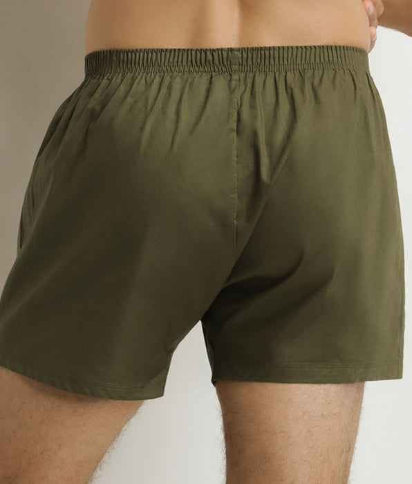 DIM Pacco da 2 boxer da uomo in cotone elasticizzato verde a righe beige.